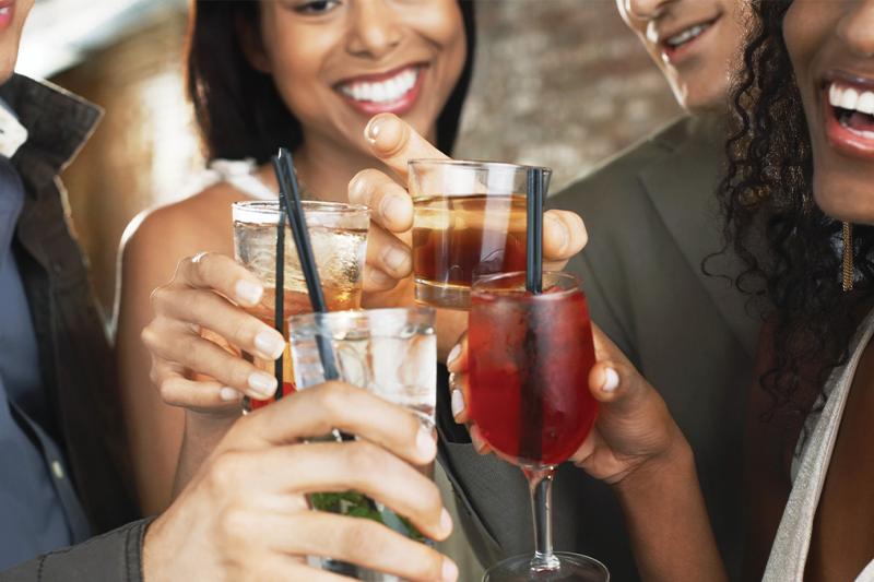 People enjoying drinks at a party